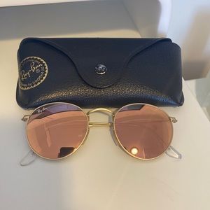 Like new. Only worn a couple of times. Rose lense round raybans.